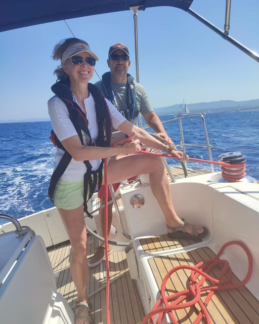 A group of novice sailors practicing their sailing skills under the watchful eye of an experienced yacht crew member in Croatia