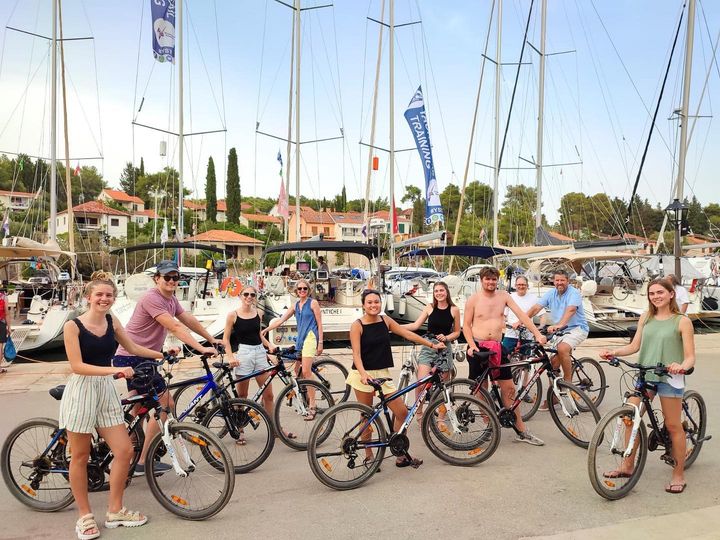 A close-up of hands-on learning as individuals navigate yachts in Croatia