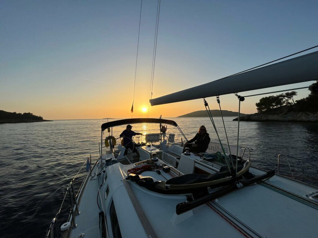 Group of sailors enjoying the sunset