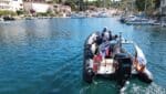 Power vs sail - A side-by-side comparison of a sailing yacht and a sleek powerboat in the Adriatic Sea.